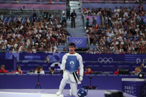 عکس معذرت خواهی قهرمان المپیک از مردم ایران!